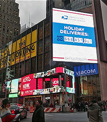 Times Square billboards track USPS totals