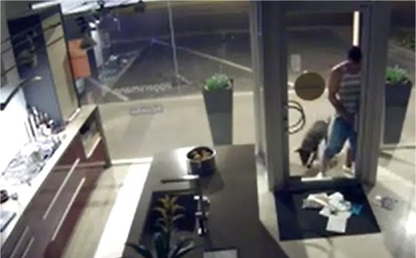 Video: Man Caught On Video Urinating Through Mail Slot of Scottsdale Shop