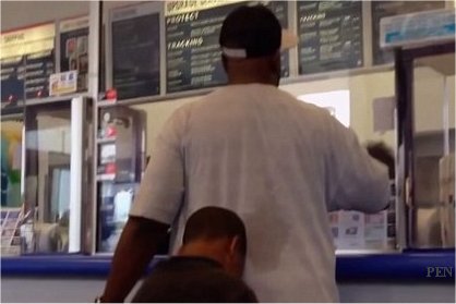 Video: Six-year-old boy hangs his head in shame as father launches sexist rant at Los Angeles Post Office staff