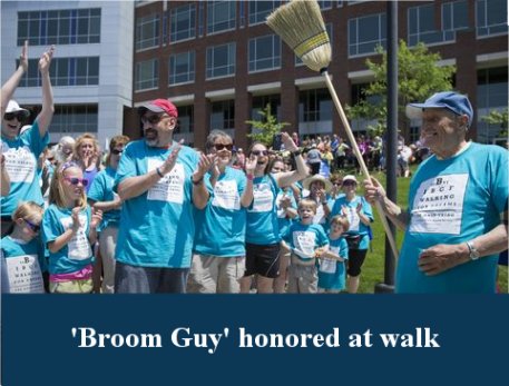 Video: ‘Broom Guy’ – once banned from post office lot – honored at walk, fair