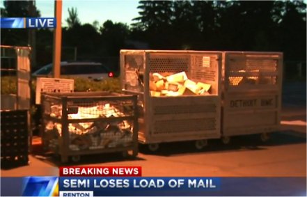 Video: Semi loses load of mail in Renton, WA