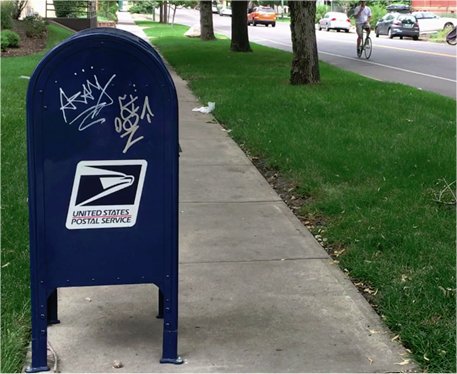 Video: Denver asks “Who in the world bolts down a mailbox in the middle of a sidewalk?”